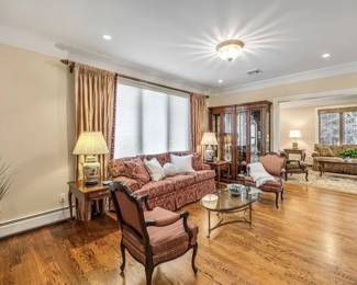 Large light up mirrored curio cabinet,glass top brass coffee table, pair of French chairs