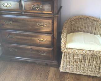 Colonial high chest and one of a pair of rattan chairs