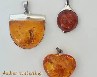 Amber set in sterling - 3 pendants