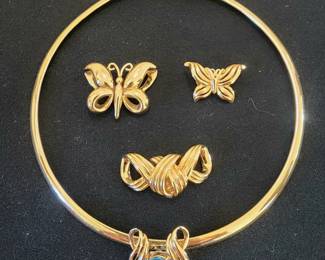 14 kt gold omega necklace with slide pendants (only part of the collection of slide pendants is shown here)