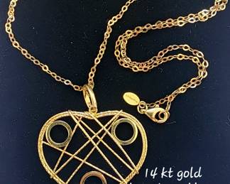 14 kt gold necklace with 14 kt gold heart pendant