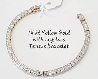 14 kt gold tennis bracelet with brilliant crystal stones