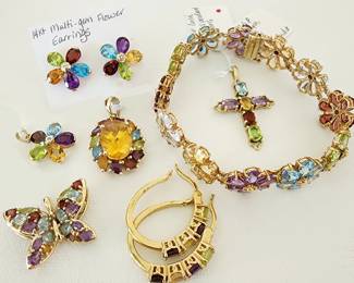 10kt & 14kt jewelry pieces with multi-colored gemstones: Topaz, aquamarine, amethyst, citrine, peridot, garnet.