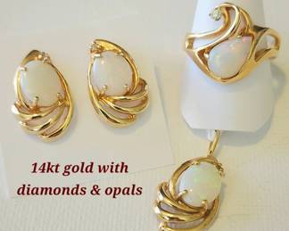 14kt gold with opals and diamonds pendant, ring and earrings set.