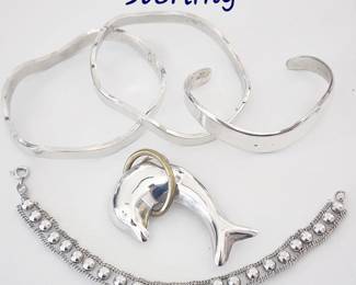 Sterling bracelets and dolphin jumping through hoop brooch