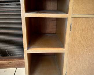 Vintage MCM credenza - 6 shelves, 1 wide drawer, 1 pullout shelf, 6 shelves. Back is finished, can be used in middle of the room.