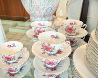 Set of Peari Fine China with rose pattern from Japan. Includes dinner, salad, bread & butter dishes; soup and fruit bowls; coffee cups & saucers; platter, serving bowl, covered casserole, gravy boat, cream & sugar