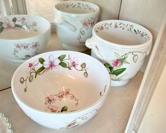 Porta "Orchids" china set from Portugal. Includes platter, 2 tall serving bowls, covered pie plate, set of 4 canisters, 2 tall mixing bowls, coffee/tea pot, watering can, covered casserole, cream & sugar