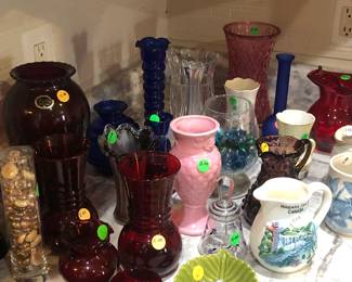 Large assortment of collectible vases and pitchers 