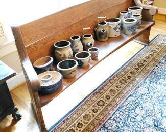 Oak church pew & Rowe Pottery collection