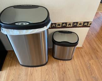 . . . stainless steel waste cans (need batteries)