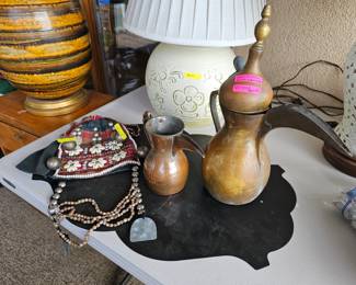 Arabian brass Dallah coffee pots and handmade tribal hat.