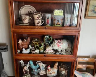 Barrister bookcase, Knox over 1950’s Oklahoma Indian pitcher and glasses, many vintage figures. 