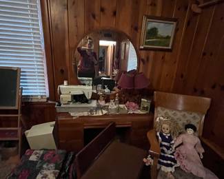Cute antique dressers and chests, vintage sewing machine, bedding