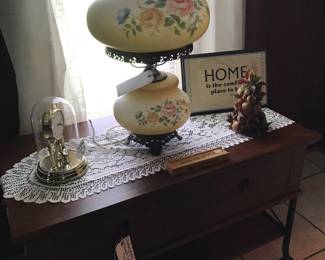 Gorgeous anniversary clock, low antique table