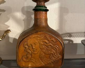 Leather covered glass decanter