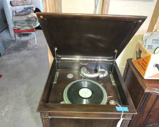 Vintage Brunswick hand crank 78 record player.