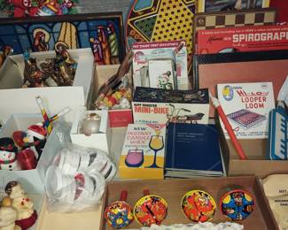 Vintage Christmas ornaments and tavern candles . Vintage games including Spirograph . Spinning tin litho toys