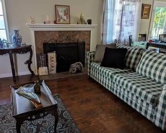 Green and white plaid sofa bed. Metal frame and in great shape.