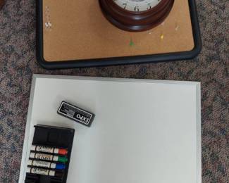 white board w/ markers & eraser, bulletin board, & clock