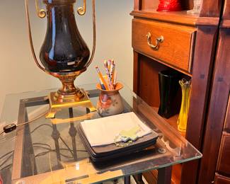 Overview of the Stifel lamps and pair of glass top coffee tables 