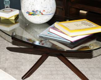 Glass top geometric wood base coffee table