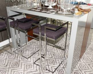 There are several of these lavender Meridian Furniture Ezra chrome stools available for sale; all in great condition. 
