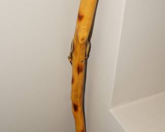 Hand carved walking stick with inlaid turquoise at the top