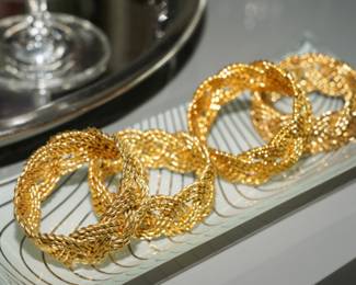 Woven gold napkin rings