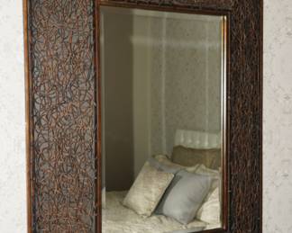 Bronzed branch framed beveled wall mirror