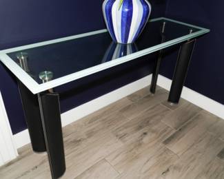 Frosted edge glass top table with leather wrapped chrome legs.  There are two of these table available.
