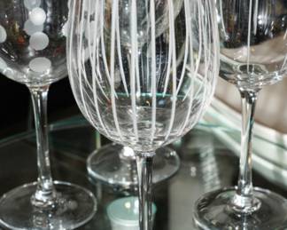 There are several Mikasa "Cheers" wine glasses, goblets, champagne flutes, rocks glasses, iced tea glasses, trays, bowls and plates available.  