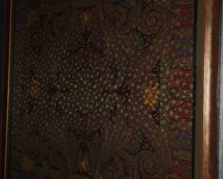 This is a framed 24k inlaid silk scarf that measures approximately 5ft square.  It is absolutely stunning!