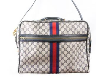 Gucci! Excellent vintage condition. We also have a small speedy duffel and other designer finds.