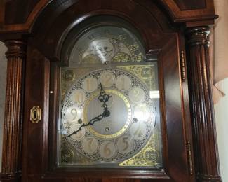 Closer look at Grandfather Clock- The wood on it is beautiful. 