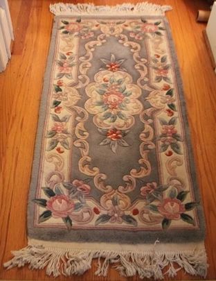 168 - Sculptured rug, 56 x 25
