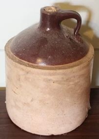 55 - Brown & white early jug, 10.5"
