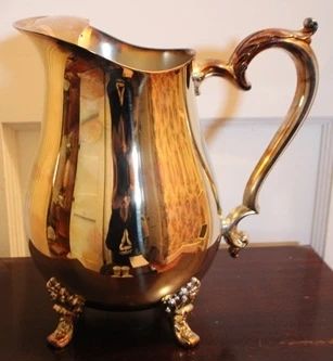 119 - Silver plate 8" pitcher

