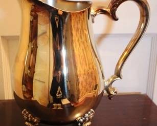 119 - Silver plate 8" pitcher

