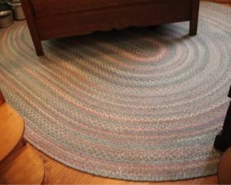 147 - Braided oval rug, 92 x 108
