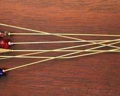 233 - Group of hatpins, 8"
