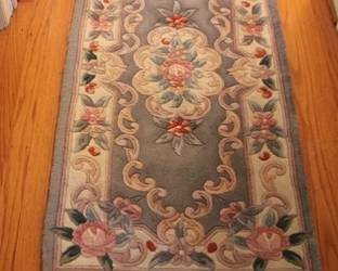 168 - Sculptured rug, 56 x 25

