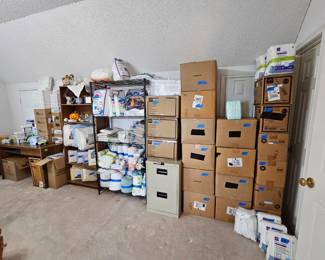 Cases and cases of medical supplies, including diapers, pads, bandages, and other necessary
