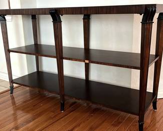 Two-shelf wood console with glass inlay on top. Has small chip on one side – $110