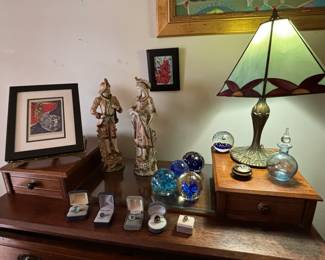 Art, rings, lamp and antique dresser.
Dresser $250
Lamp $65
Paperweights $10
Rings $10-40