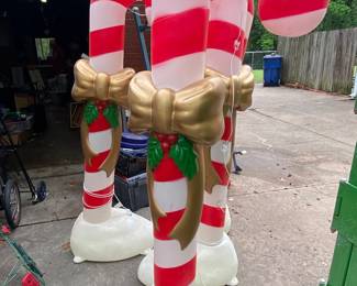 Four 6’ candy cane blow molds