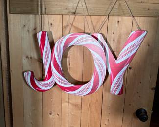 Joy candy cane hanging letters on thin board with twine hangers, each letter is 15"H
