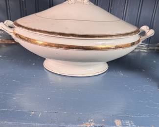 Saxony porcelain covered casserole with gold banding, some wear to decoration 10"L