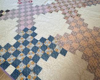 Triple Irish Chain quilt with intricate wreaths and stitchwork, minor stain, lavender border 6'10" x 5'4"
