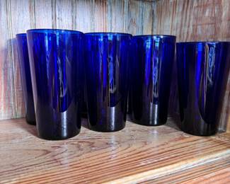 Cobalt blue thick glass drinkware, likely Libbey